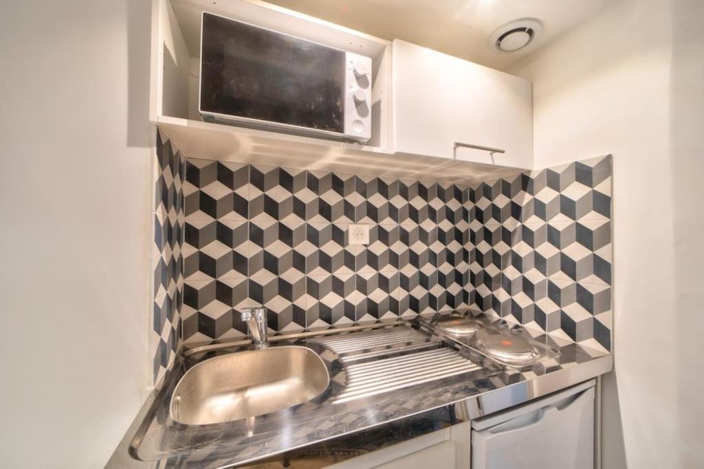 Bel Appartement Au Coeur De Montmartre Paris Exterior foto